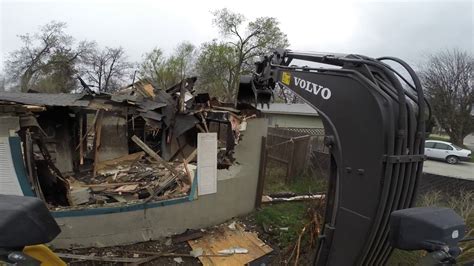 mini excavator house demolition|abandoned houses for demolition.